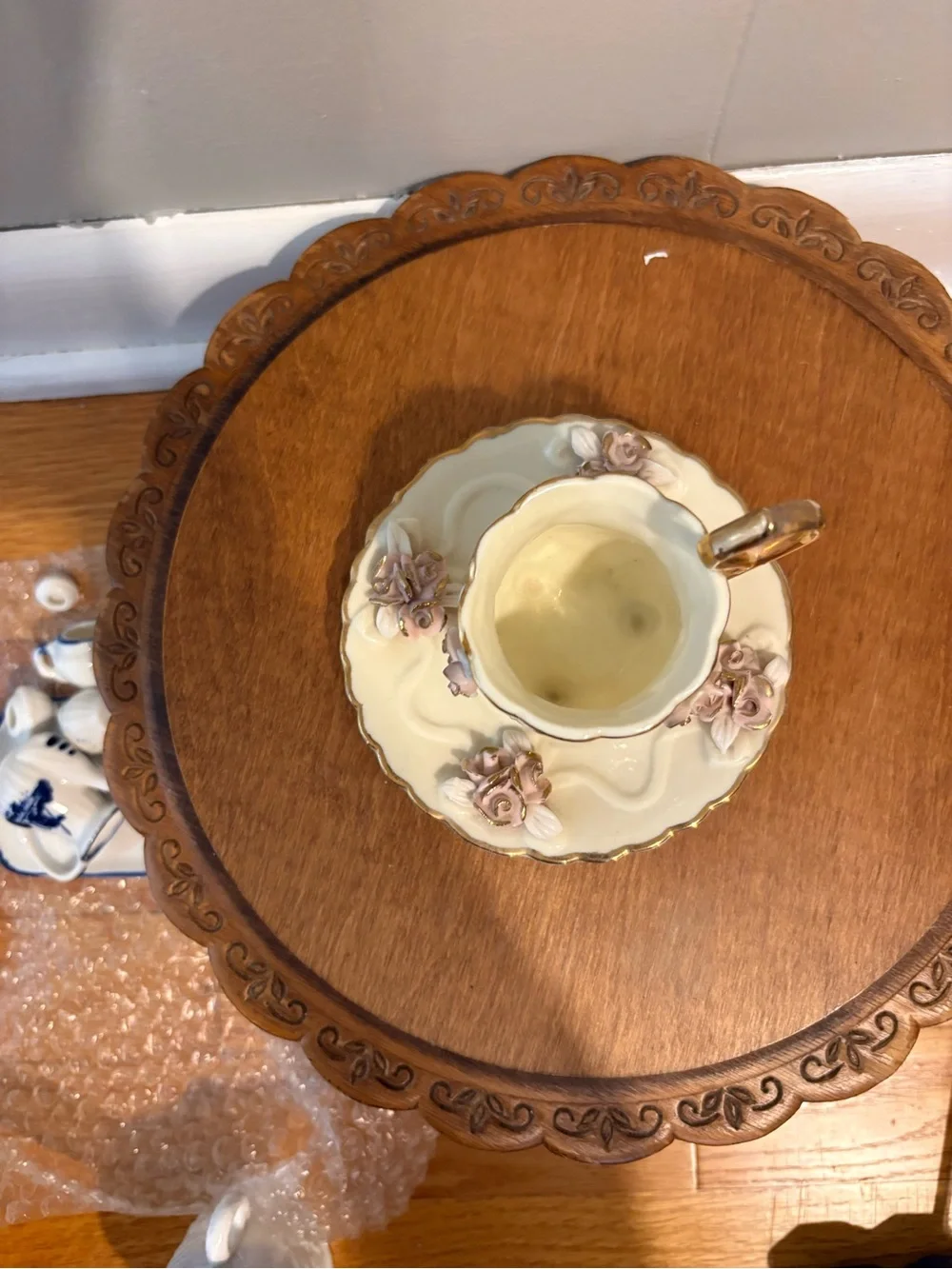 Ornate White Porcelain Pedestal Cup & Saucer with Pink Roses and Gold Trim